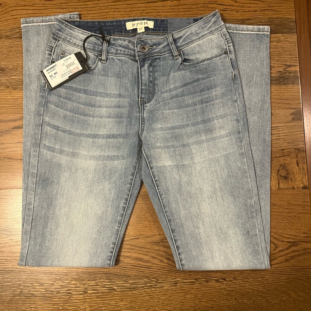 # 79- Blue Skinny Jeans with Natural Wear Patterns
